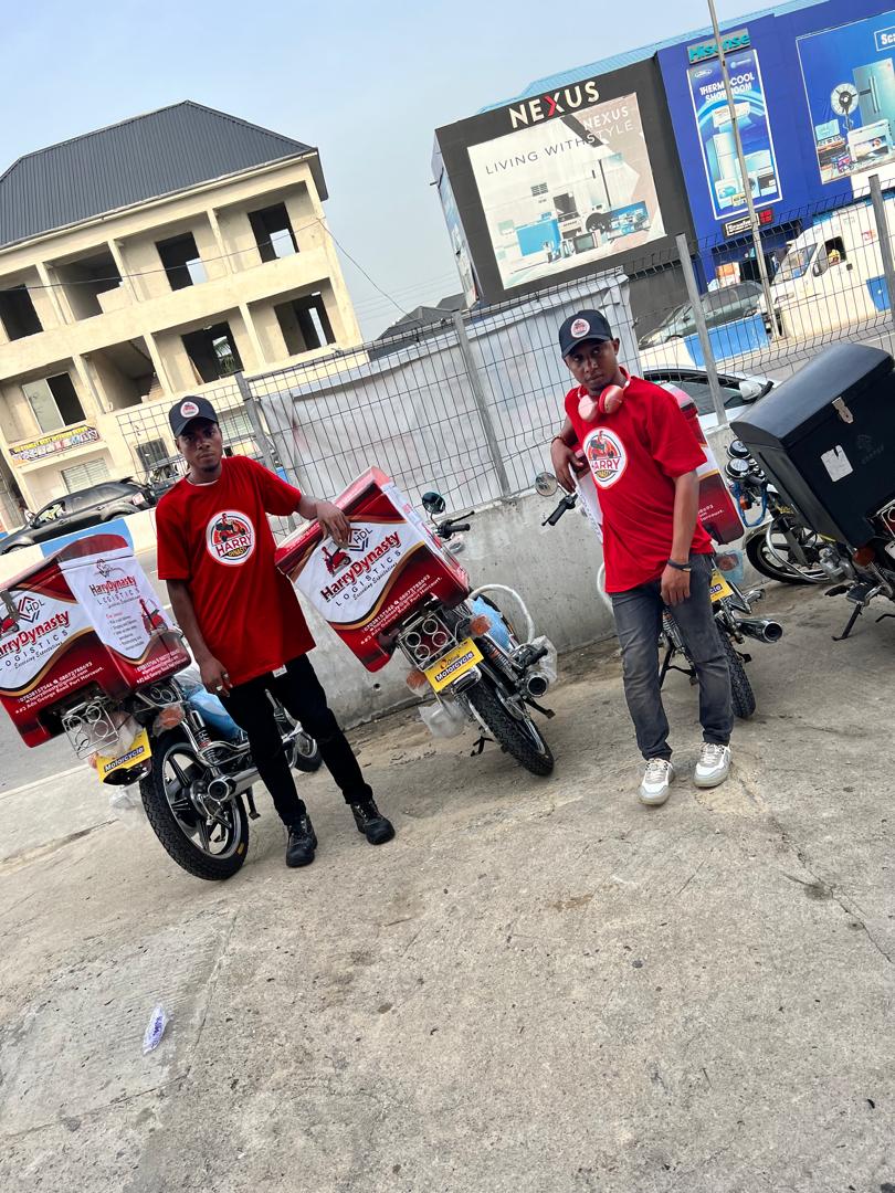 Harry Dynasty riders on the street with branded delivery boxes